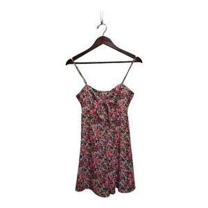 Adorable peach floral romper by Cider. Size Small